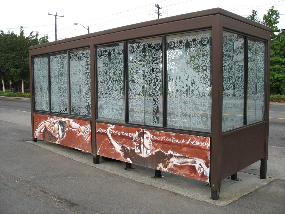Bus stop under the I-5 overpass at the corner of Eastlake and Harvard.