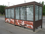 Bus stop under the I-5 overpass at the corner of Eastlake and Harvard.